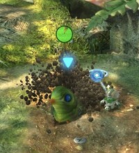 Armored Cannon Larva burrowing.jpg